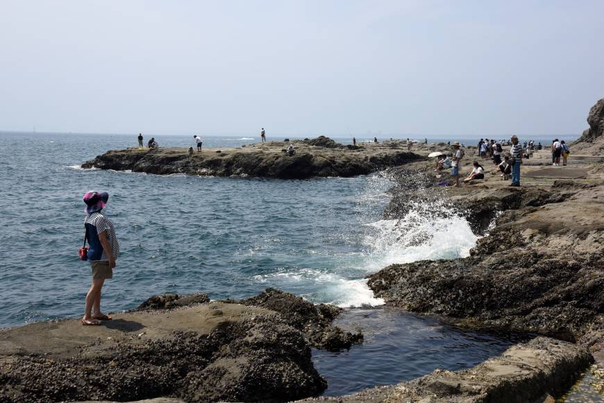The Chigogafuchi rock beach is at the end of a walking trail on the ocean side of Enoshima Island.
