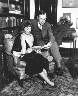 Amelia Earhart and her husband, George P. Putnam, relax at home in 1931.