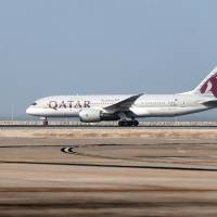 A Qatar Airways plane takes off July 20 from the Hamad International Airport in Doha. Saudi Arabia on Sunday said Qatar had refused to allow its planes to land in Doha to transport Qatari Muslims to Mecca for the annual hajj pilgrimage. | AFP-JIJI