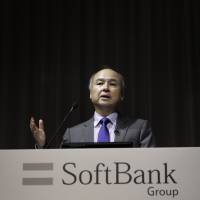 Masayoshi Son, chairman and chief executive officer of SoftBank Group, speaks at a press conference in Tokyo last week. | BLOOMBERG