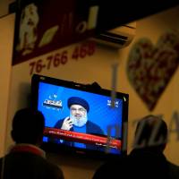 Lebanon\'s Hezbollah leader, Sayyed Hassan Nasrallah, is seen speaking on television in Sidon in southern Lebanon Thursday. | REUTERS