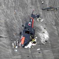 A Maritime Self-Defense Force CH-101 helicopter crashed Thursday at the MSDF Iwakuni Base in Yamaguchi Prefecture, after it flipped over during a drill. | KYODO