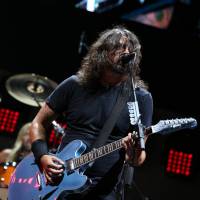 Sunday night lights: Foo Fighters\' Dave Grohl took to the Marine Stage on Sunday night to headline the Tokyo leg of this year\'s Summer Sonic festival. He was joined by singer Rick Astley during one particularly memorable performance. | © SUMMER SONIC ALL RIGHTS RESERVED