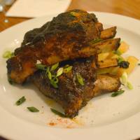 Down home: The barbecue spare ribs in red wine sauce at Southern Peas are a slice of New Orleans. | J.J. O\'DONOGHUE