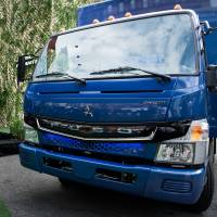 The Mitsubishi Fuso eCanter truck is unveiled during a launch event in New York on Thursday. | BLOOMBERG