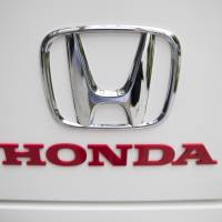 Honda Motor Co. will tie up with Chinese firm Neusoft to develop a battery management system for an electric vehicle it plans to launch in China. | BLOOMBERG