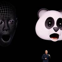 The \"animoji\" feature, which lets people animate emoji characters with their own voice and facial expressions and then send them to their friends, is demonstrated by Apple Senior Vice President of Worldwide Marketing, Phil Schiller, during a launch event on Tuesday in Cupertino, California. | REUTERS