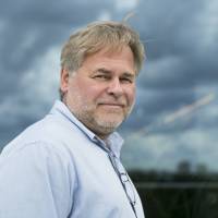 Eugene Kaspersky, Russian antivirus programs developer and chief executive of Russia\'s Kaspersky Lab, poses for a July 1 photo on a balcony at his company\'s headquarters in Moscow. On Wednesday, the U.S. banned the use of computer software supplied by Kaspersky Lab at federal agencies because of concerns about the company\'s ties to the Kremlin and Russian spy operations. | AP