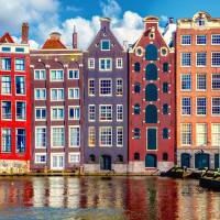 Iconic canal-side homes are seen in Amsterdam. Mitsubishi UFJ Financial Group Inc. is said to have chosen the city as its base for investment banking in the European Union after Brexit. | ISTOCK