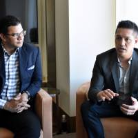 Michael Aragon (right), Twitch\'s senior vice president of content, speaks during a recent interview in Tokyo as Raiford Cockfield III, head of Twitch\'s Tokyo office, looks on. | SATOKO KAWASAKI