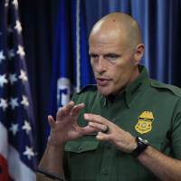 U.S. Customs and Border Protection Acting Deputy Commissioner Ronald Vitiello speaks to reporters during a news conference announcing the selected vendors for construction of the concrete wall prototypes for the border wall Thursday in Washington. | AP