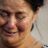 Frances Breaux cries as she talks about her fears for two close friends who live near the Arkema Inc. chemical plant Thursday in Crosby, Texas. Breaux said her close friends, an elderly couple who live close to the plant, have not been heard from Thursday. | AP