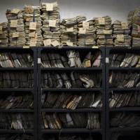 Various court case documents are pictured outside a courthouse along a hallway in Quezon City, Metro Manila, in June. | REUTERS