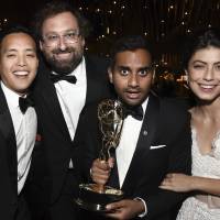 Attendees (from left) Kelvin Yu, Eric Wareheim, Aziz Ansari and Alessandra Mastronardi appear at the Governors Ball during the 2017 Primetime Emmys Awards at the Microsoft Theater on Sunday in Los Angeles. | RICHARD SHOTWELL / INVISION / VIA AP