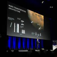 Elon Musk, founder of SpaceX, speaks during a news conference on Friday at the International Astronautical Congress in Adelaide, Australia. | REUTERS