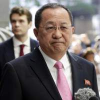 North Korean Foreign Minister Ri Yong Ho speaks outside the U.N. Plaza Hotel in New York on Monday. | AP