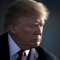 U.S. President Donald Trump waits to speak during a memorial service Monday at the Pentagon for the 9/11 terrorist attacks in Washington. | AFP-JIJI
