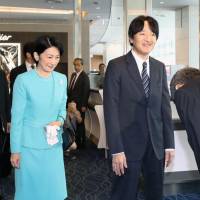 Prince Akishino and his wife, Princess Kiko, are seen at Tokyo\'s Haneda airport on Monday before departing for their 10-day trip to Chile. | KYODO