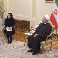 Masahiko Komura, a special envoy of Prime Minister Shinzo Abe, holds talks with Iranian President Hassan Rouhani in Tehran on Wednesday. | KYODO