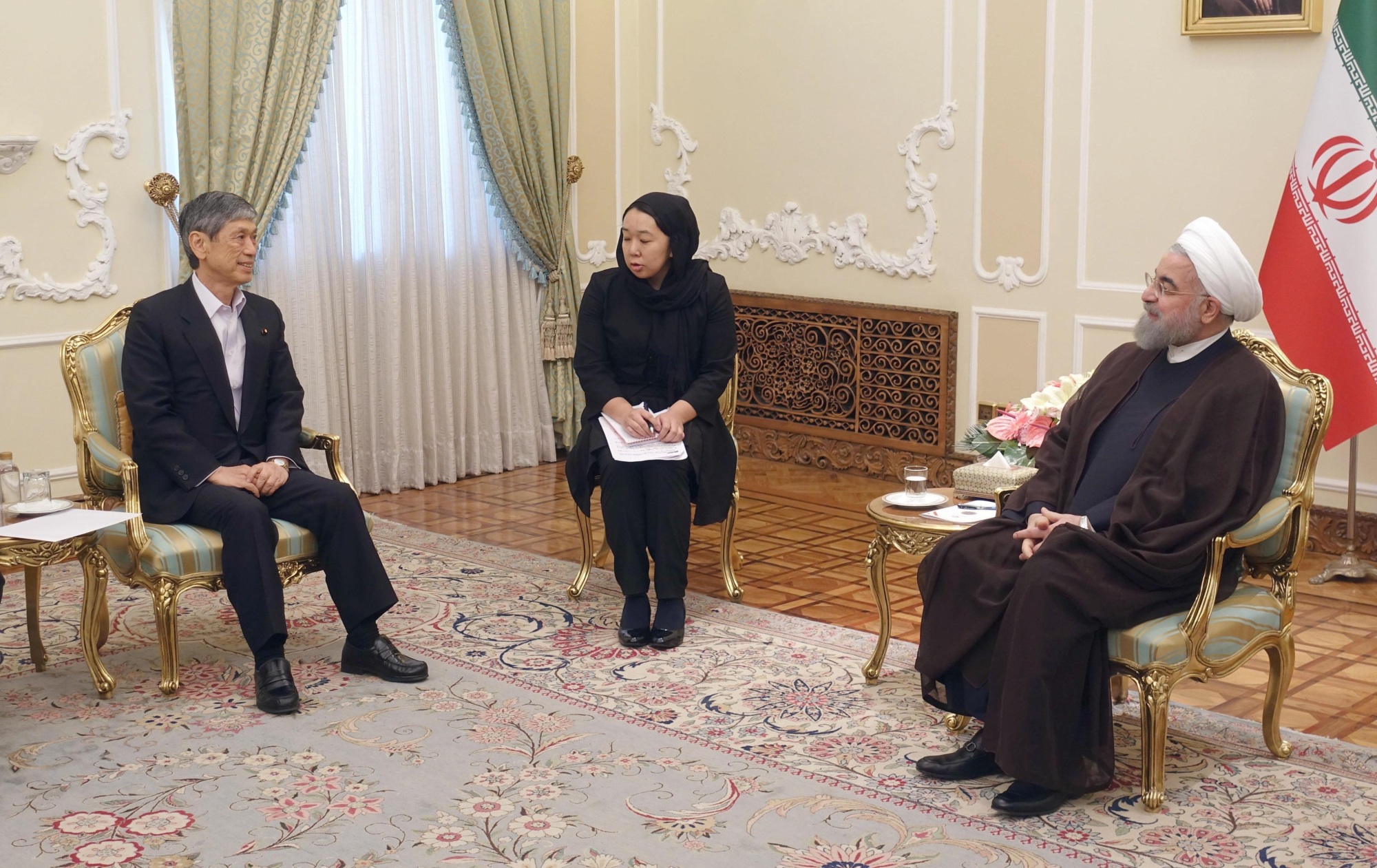 Masahiko Komura, a special envoy of Prime Minister Shinzo Abe, holds talks with Iranian President Hassan Rouhani in Tehran on Wednesday. | KYODO