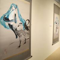 A scroll combining virtual pop singer Hatsune Miku with a work by the 18th-century painter Ito Jakuchu is exhibited Wednesday in Kyoto. | KYODO