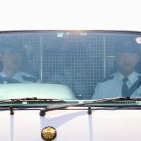 A van carrying Vayron Jonathan Nakada Ludena arrives at a police station in Kumagaya, Saitama, in May 2016. KYODO | ISTOCK