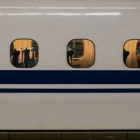 A shinkansen is seen in this undated image. On Sunday, a shinkansen passenger\'s tablet computer apparently caught fire, forcing an emergency halt to the train. | ISTOCK