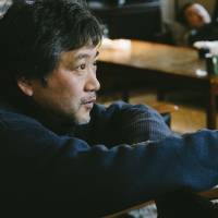 Murder most foul: Hirokazu Koreeda on the set of his latest film, \"The Third Murder.\" The crime and suspense aspects might be new to the filmmaker\'s work, but the movie still contains comments on the family structure that are part of his signature style. | &#169; 2017 FUJI TELEVISION NETWORK/AMUSE INC./GAGA CORPORATION ALL RIGHTS RESERVED.