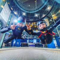 FlyStation Japan receptionists take a break in the wind tunnel. | COURTESY OF FLYSTATION JAPAN