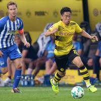 Borussia Dortmund midfielder Shinji Kagawa won\'t play in Japan\'s upcoming Group B World Cup final-round qualifier against host Saudi Arabia. | KYODO