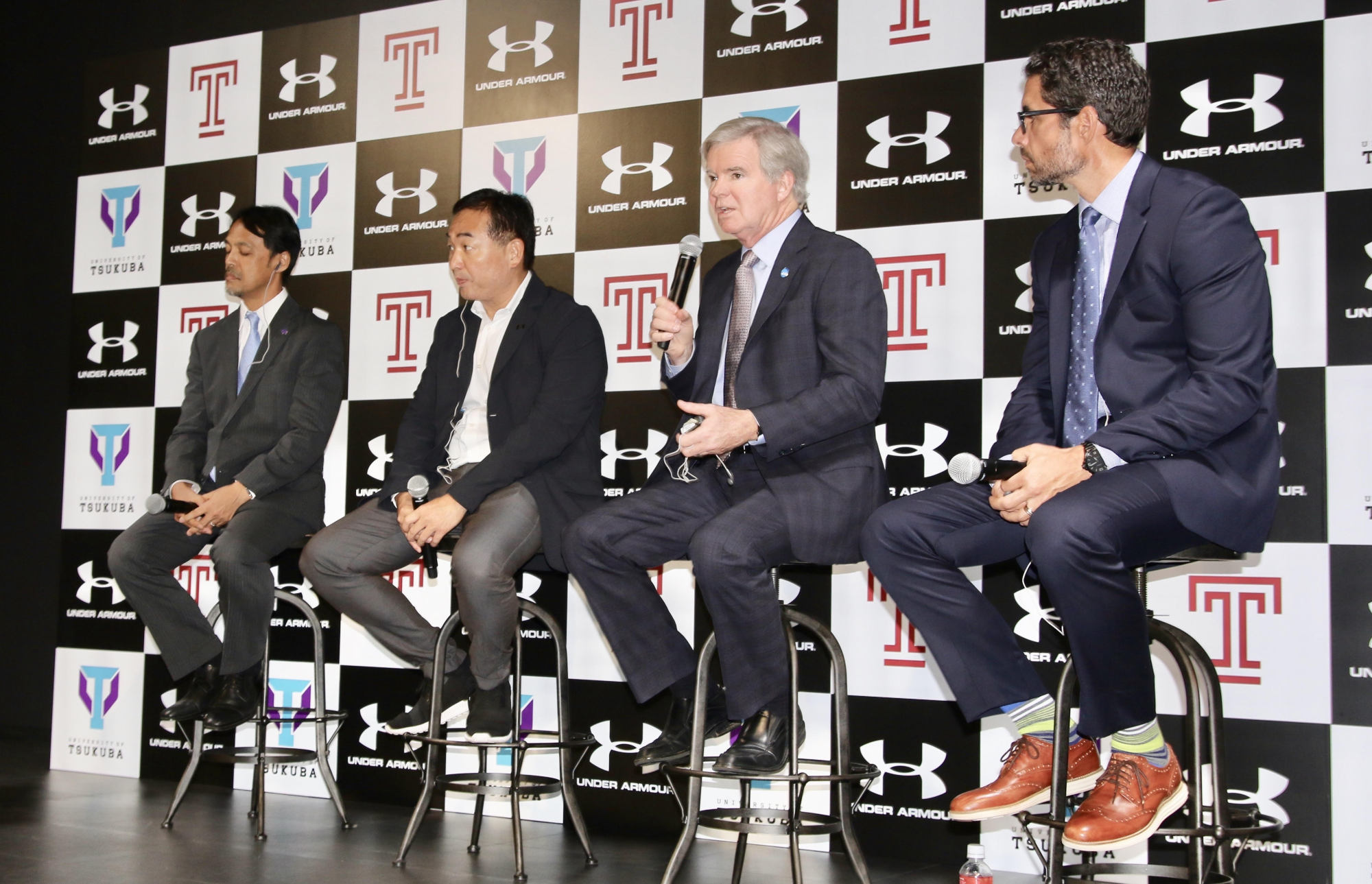 NCAA president Mark Emmert speaks during a panel discussion on Japan's planned college sports governing body with University of Tsukuba associate professor Tsuyoshi Matsumoto (far left), Dome Corporation CEO Shuichi Yasuda (second from the left) and Temple University professor Jeremy Jordan on Wednesday in Tokyo. | KAZ NAGATSUKA