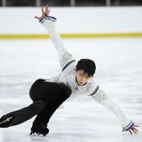 Yuzuru Hanyu performs his free skate program at the Autumn Classic on Saturday in Montreal. Hanyu finished the event in second place behind Javier Fernandez. | KYODO