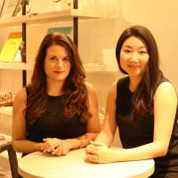 Annmarie Sairrino Bailey (left) and Moeko Suzuki of Akatsuki Entertainment USA pose at Akatsuki Inc.\'s Tokyo headquarters Sept. 28. | AKATSUKI INC.