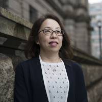 Risa Ueda, head of the commercial banks examination-planning division at the Bank of Japan, poses for a photograph at the BOJ headquarters in Tokyo on Sept. 13. | BLOOMBERG