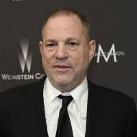 Harvey Weinstein arrives Jan. 8 at The Weinstein Company and Netflix Golden Globes afterparty in Beverly Hills, California. The Weinstein Co.\'s board said in a statement Tuesday that Weinstein had resigned. | CHRIS PIZZELLO / INVISION / VIA AP