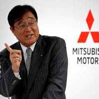 Mitsubishi Motors Corp. CEO Osamu Masuko speaks at a news conference at its company headquarters in Tokyo on Wednesday. | REUTERS