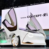 Toyota displays its EV concept car Concept-i, a vehicle equipped with an artificial intelligence system, at a media preview at the Tokyo Motor Show on Wednesday. | YOSHIAKI MIURA