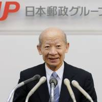 Taizo Nishimuro attends a 2003 news conference after assuming the post of Japan Post Holdings Co.\'s president. KYODO | REUTERS
