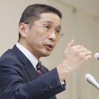 Nissan Motor Co. CEO Hiroto Saikawa, who also chairs the Japan Automobile Manufacturers Association, gives a news conference last week at Nissan\'s headquarters in Yokohama. | KYODO