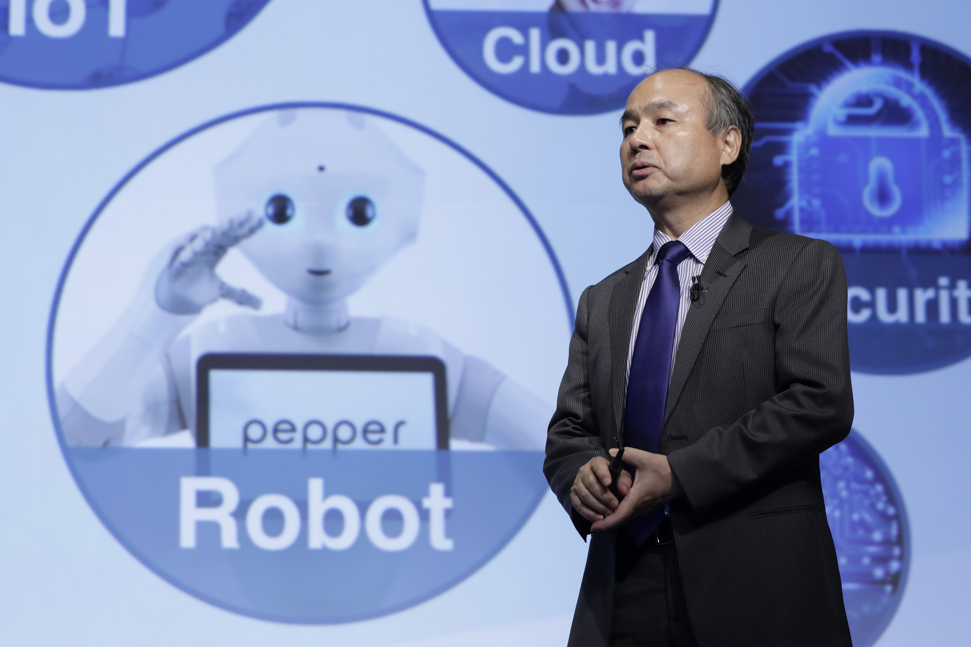 Billionaire Masayoshi Son, chairman and CEO of SoftBank Group Corp., speaks during a news conference in Tokyo on Aug. 7. | BLOOMBERG