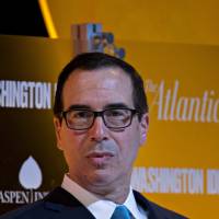 Steven Mnuchin, U.S. Treasury secretary, listens to a question during a discussion at The Atlantic\'s Washington Ideas conference in Washington on Thursday. Mnuchin at the event said the GOP\'s plan in its tax proposal for 2.9% annual growth over a decade is \"doable\" and that 6 percent growth is \"optimistic.\" | BLOOMBERG