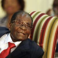 Zimbabwe\'s President Robert Mugabe meets with South African President Jacob Zuma at the Presidential Guesthouse in Pretoria, South Africa, on Oct. 3. | AP