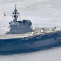U.S. President Donald Trump is considering making an inspection of the Maritime Self-Defense Force helicopter carrier Izumo, seen in this file photo, during his visit to Japan next month, according to sources. | KYODO