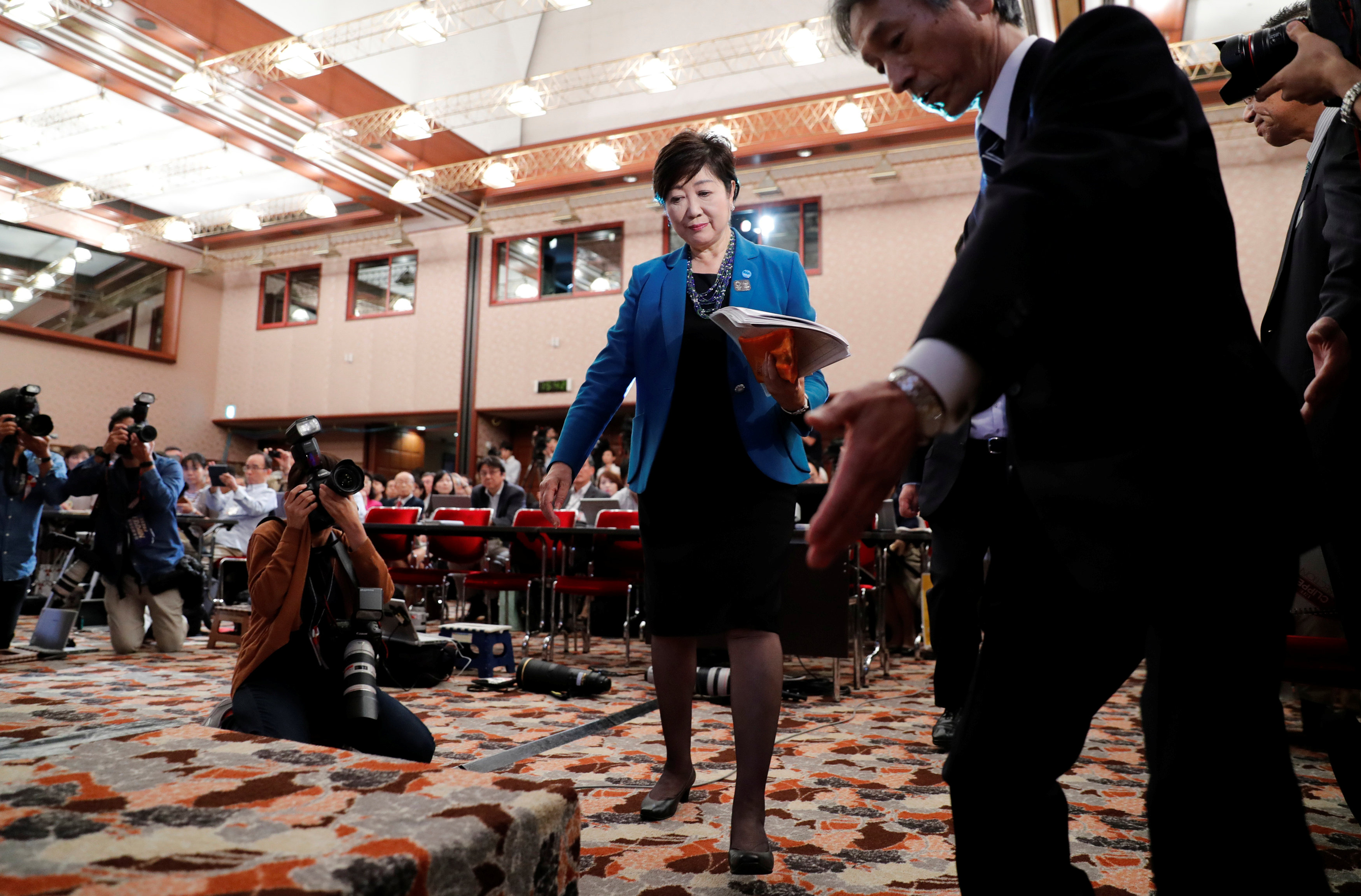 Tokyo Governor Yuriko Koike arrives for a news conference at the Japan National Press Club in Tokyo on Sept. 28. | REUTERS