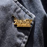 Ippudo’s badge reads “zuzutto” (slurping sound of noodles), a phrase it aims to popularize. | YOSHIAKI MIURA