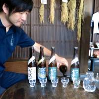 Sake sampling: Customers can try before they buy at Tomita Shuzo. | ROBBIE SWINNERTON