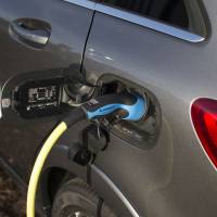 Filling stations featuring charging plugs  are becoming an increasingly familiar sight in many countries as governments push the sales of electric vehicles to  reduce air pollution. | BLOOMBERG