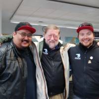 Marooned: C.W. Nicol in Resolute\'s fog-bound airport with two Inuit shipmates, Josh Quamariaq (left) and Anguti Johnson, who broke out a drum and guitar to while away the time with song and dance. | IZUMI MORITA