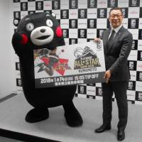 Popular mascot Kumamon and B. League chairman Masaaki Okawa are seen at a news conference on Tuesday in Tokyo to promote the 2018 All-Star Game in Kumamoto. | KYODO
