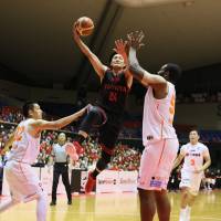 The Alvark\'s Daiki Tanaka leaps as he takes a shot in first-quarter action on Tuesday in Tokyo. | B. LEAGUE